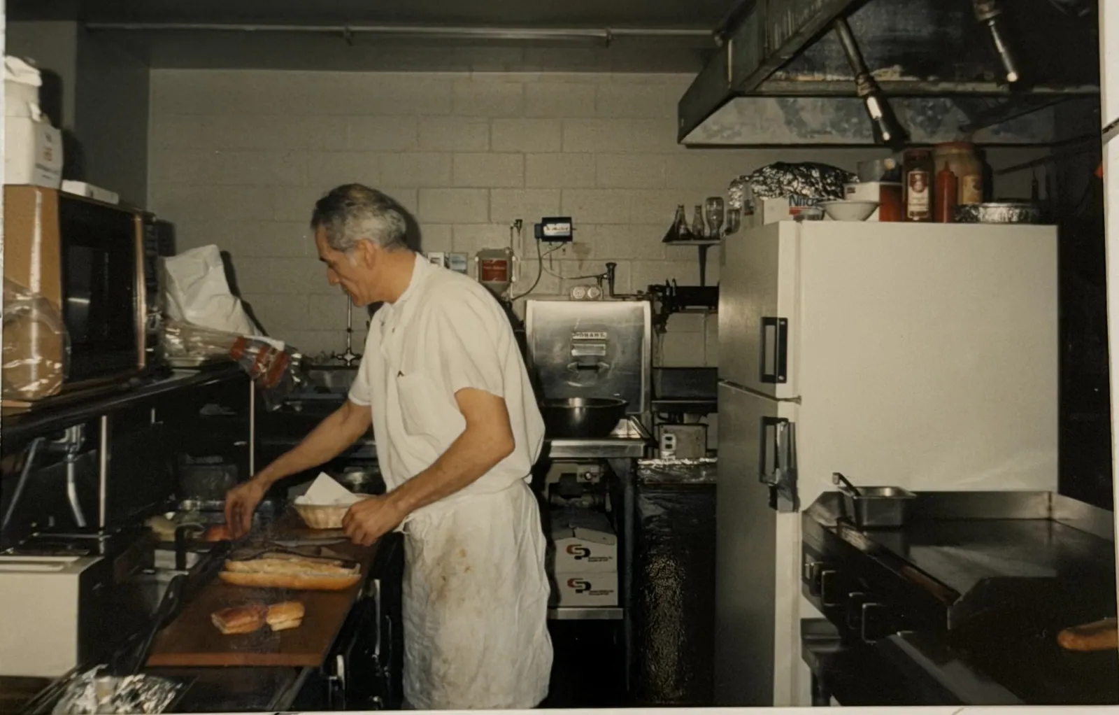 George Vlasidis working the kitchen line